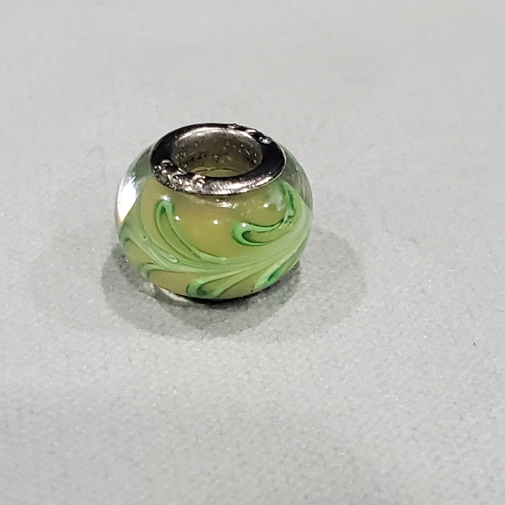 Sterling silver green glass bead